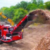Bandit tracked wood grinder processing wood waste