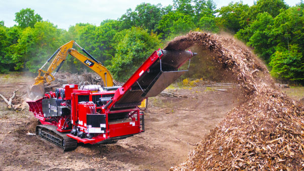 Bandit tracked wood grinder processing wood waste