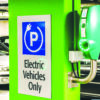Electric vehicle charging station with designated EV parking.