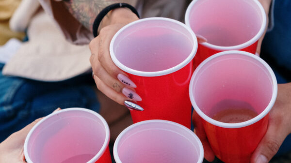 Red plastic party cups made from polystyrene gathered for recycling