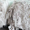Bales of recovered paper trim and paper scrap prepared for recycling into new paper products.