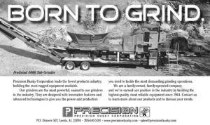Precision Husky ProGrind 4000 tub grinder processing wood waste for recycling and biomass applications.