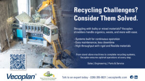 Vecoplan industrial shredder processing recyclable materials in a waste recycling facility.