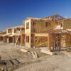 New residential homes under construction in a housing development.