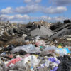 Municipal landfill with waste materials supporting landfill gas collection for renewable natural gas production