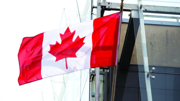 Canadian flag representing tariffs on Canadian plastics