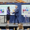 Representatives at an awards ceremony presenting a recognition for Recycle BC and SK Recycles' flexible plastics recycling initiative.