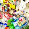 Mixed plastic packaging waste, including bottles, containers and wrappers, illustrating plastics recycling and extended producer responsibility (EPR).